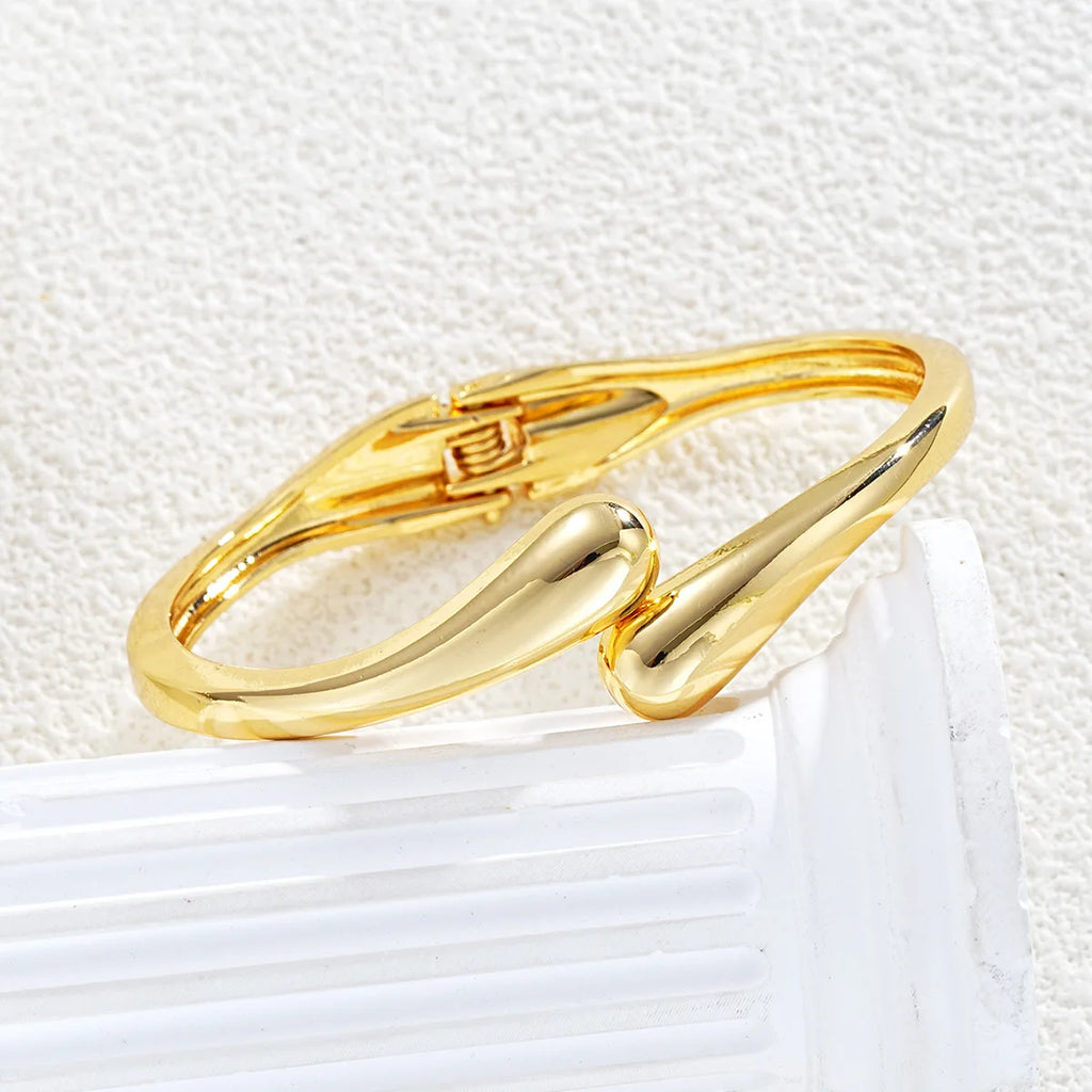 Aurelia Gold Curve Bracelet