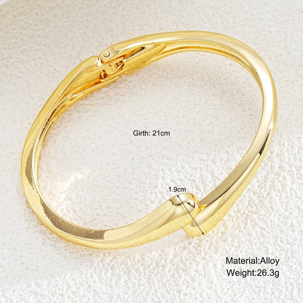 Aurelia Gold Curve Bracelet