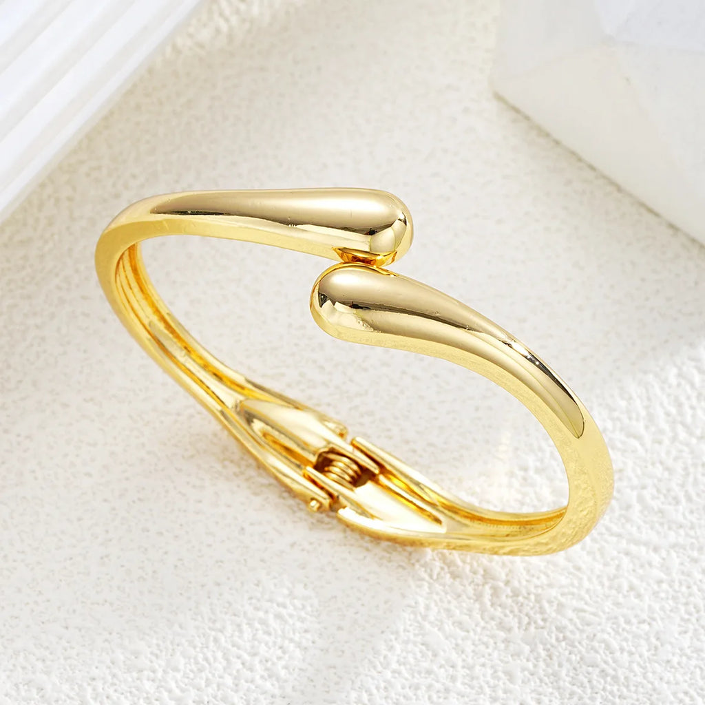 Aurelia Gold Curve Bracelet
